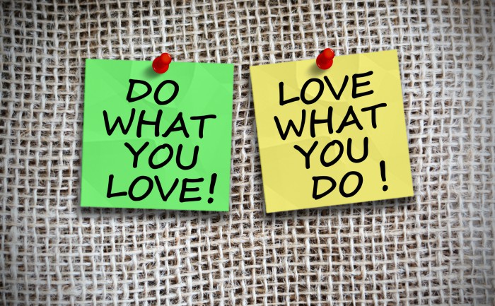 Two Post-it notes on a board, each reading “Do What You Love” and “Love What You Do” respectively