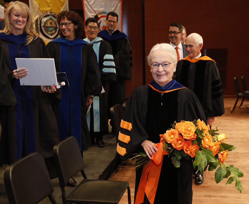 UTEP President Diana Natalicio earned a standing ovation and a bouquet of orange roses after her annual State of the University address Oct. 11, 2018, in the Fox Fine Art Center's Recital Hall.  
