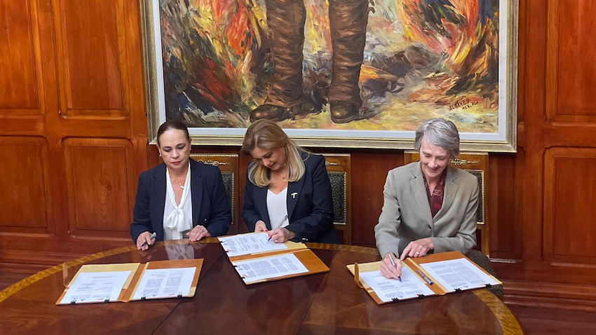 UTEP President Heather Wilson (right) and Sandra Gutiérrez Fierro (left), secretary of education of the state of Chihuahua, Mexico, met today in the city of Chihuahua to sign an agreement that formalizes the intent of both entities to work together to revamp the licensure process for UTEP graduates from that state. Chihuahua Governor María Eugenia Campos Galván (center) and Luis Rivera Campos (not pictured), president of the Autonomous University of Chihuahua (UACH), served as official witnesses to the signing. 