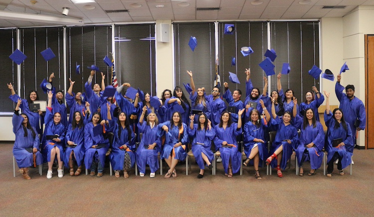The High School Equivalency Program's Class of 2021-22 celebrates their graduation. The UTEP program supports migrant and seasonal farmworkers in their pursuit of a High School Equivalency Certificate. Photo credit: Luis Andres Gomez 