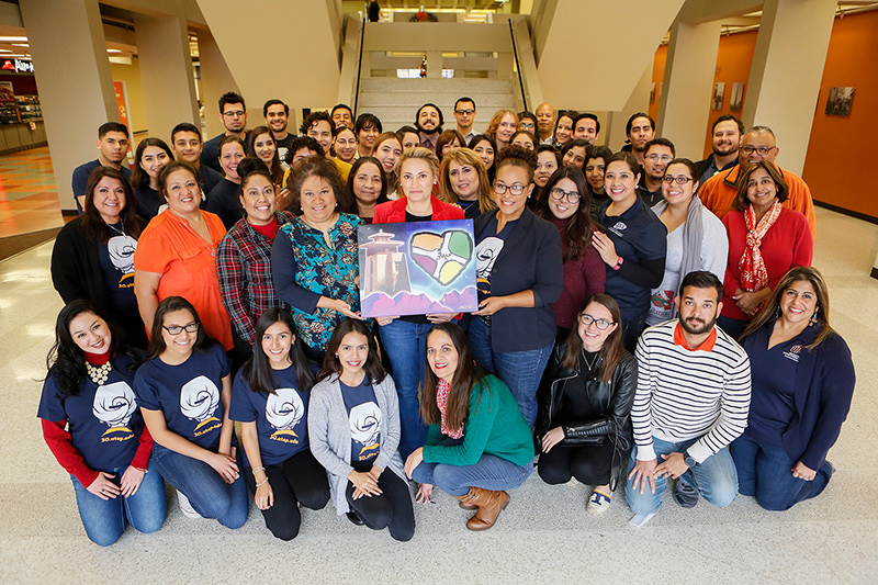 The Traveling SECC Spirit Award Painting is given to the department that has the most spirit in spreading awareness and support for the State Employee Charitable Campaign. This year, the award was presented to UTEP’s Extended University. Photo: J.R. Hernandez / UTEP Communications 