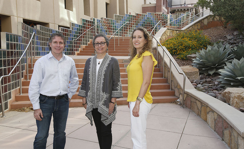 Ann Gates, Ph.D., center, professor and chair of UTEP’s Department of Computer Science, was named a recipient of a National Science Foundation (NSF) grant worth $9,900,000. Gates is one of a number of collaborators — including Enrico Pontelli, Ph.D., left, dean of the College of Arts and Sciences at New Mexico State University, and Andrea Tirres, right, interdisciplinary network manager within UTEP’s Office of Research and Sponsored Projects — who work with counterparts at other institutions and organizations to make up the Computing Alliance of Hispanic-Serving Institutions (CAHSI). Photo: J.R. Hernandez / UTEP Communications 