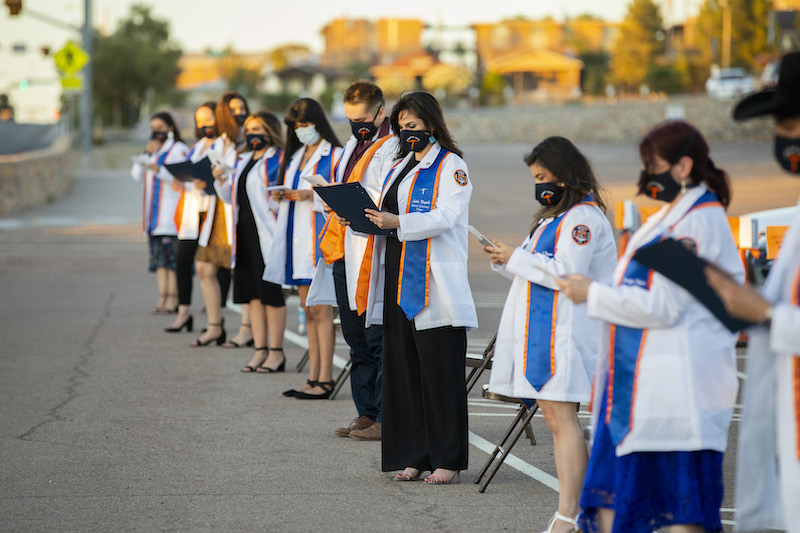 Twenty graduates from The University of Texas at El Paso’s Clinical Laboratory Science (CLS) program received their white lab coats during a special drive-in ceremony at 7 p.m. Saturday, May 16, 2020, on the UTEP campus.  Photo by Ivan Pierre Aguirre / UTEP Communications 
