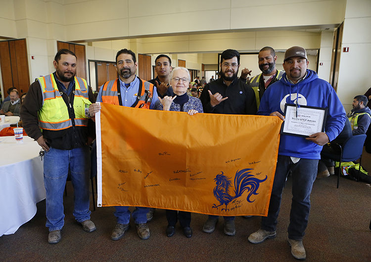 The “topping out” of the Interdisciplinary Research Building was celebrated on Feb. 11, 2019, in the El Paso Natural Gas Conference Center. University leaders and construction workers who participated in the project signed an orange flag with a rooster on it that will remain on top of the building through the remainder of the project. The rooster has a special cultural significance in Bhutan, the small Himalayan kingdom that has influenced the University’s architecture since 1917. Photo: JR Hernandez / UTEP Communications 