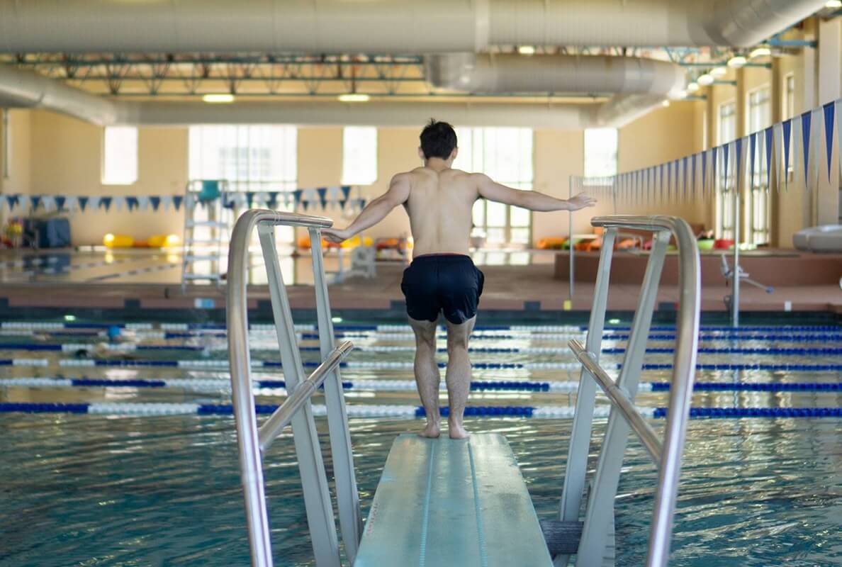 Student take a drice in the pool